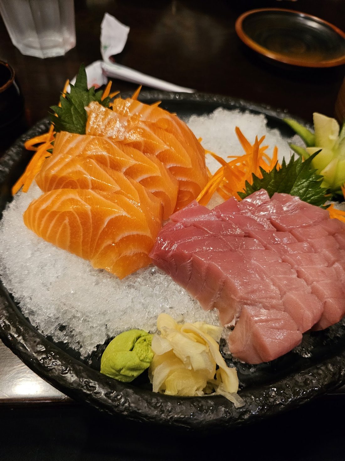 Assorted fresh sashimi served over ice at Tenkuu